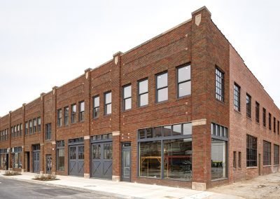 1417 Integrated Studio Walnut exterior view with brick