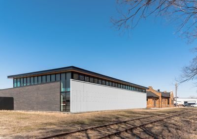 Des Moines Heritage Trust outdoor and railroad view from behind