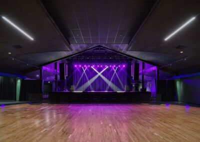 Renovated Val Air Ballroom center stage with lights